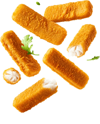 Fish fingers tumbling through the air with rocket leaves