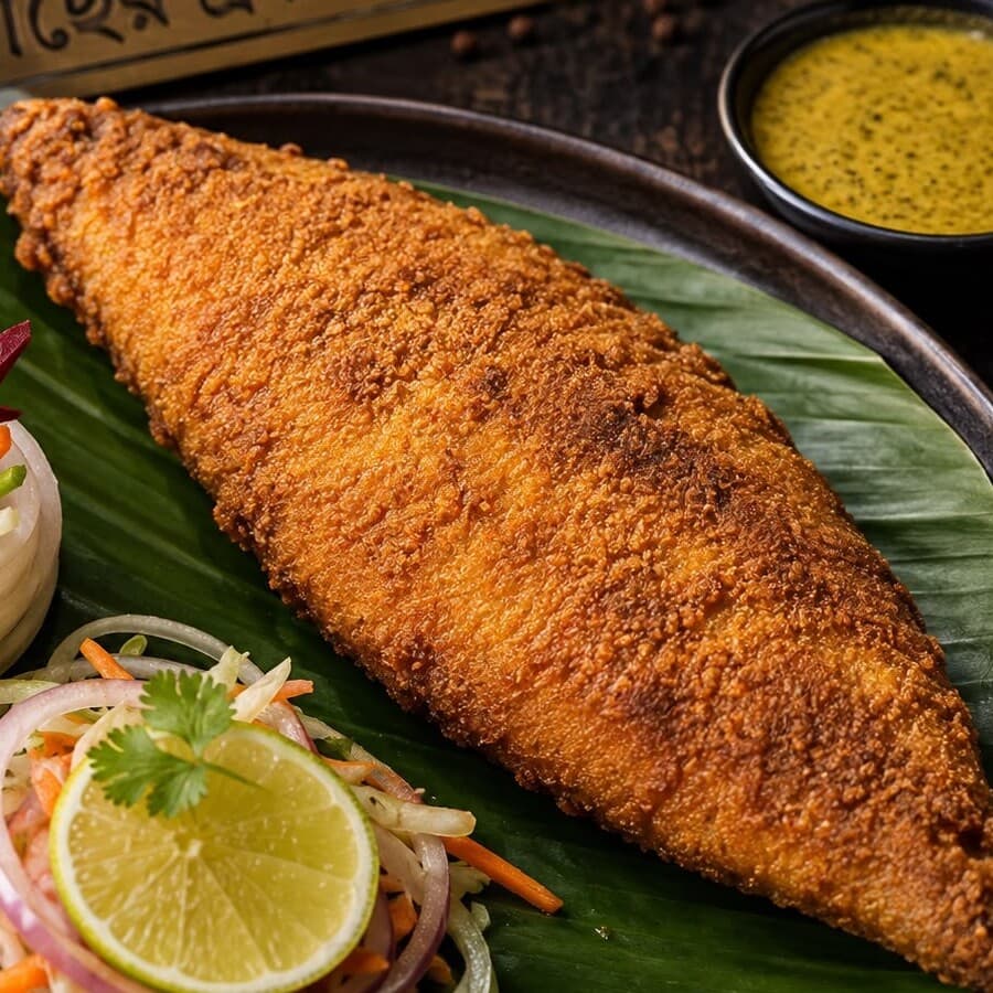 A full Fiishy plate with fish fry, kasundi and salad